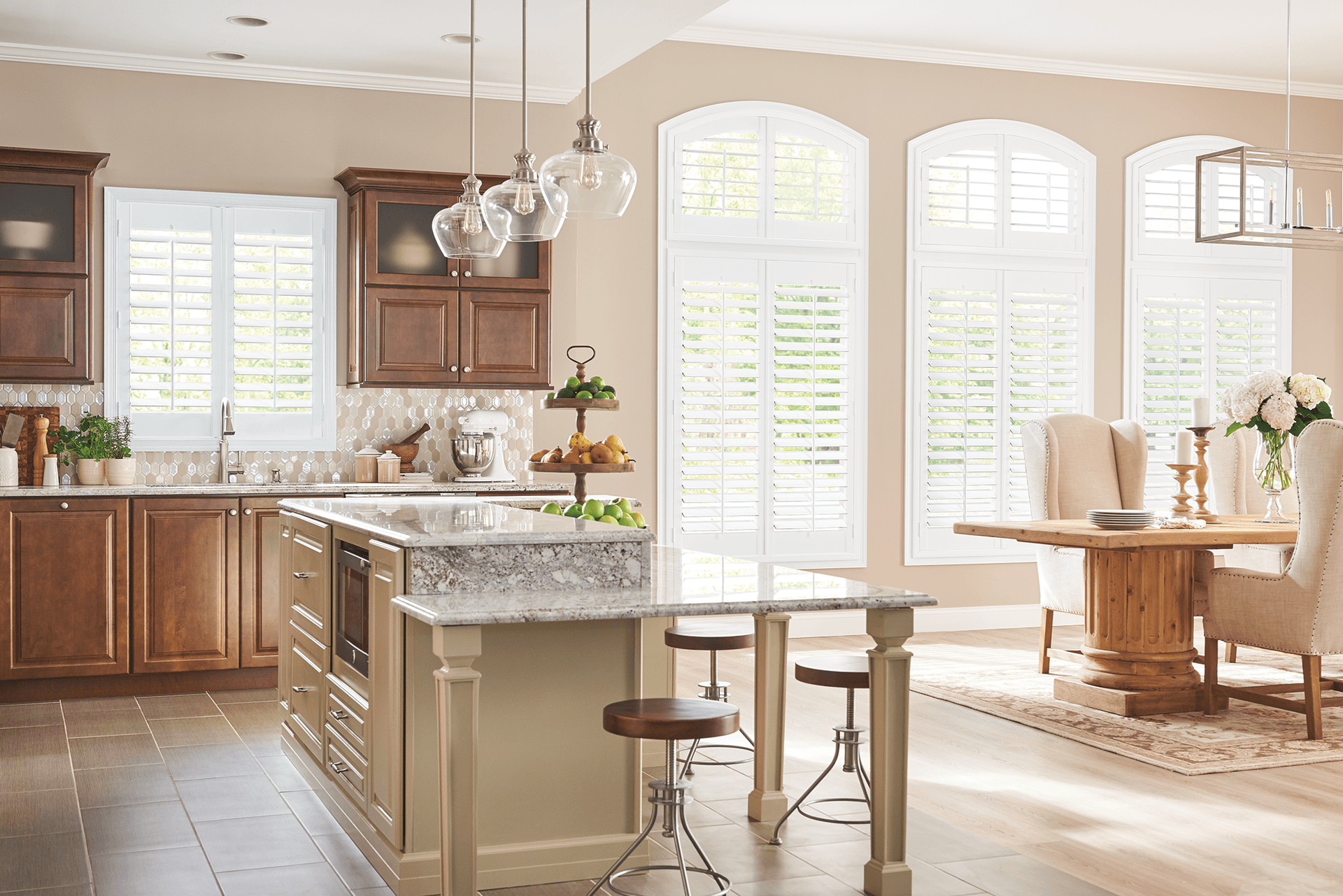 White shutters in kitchen and arched window shutters