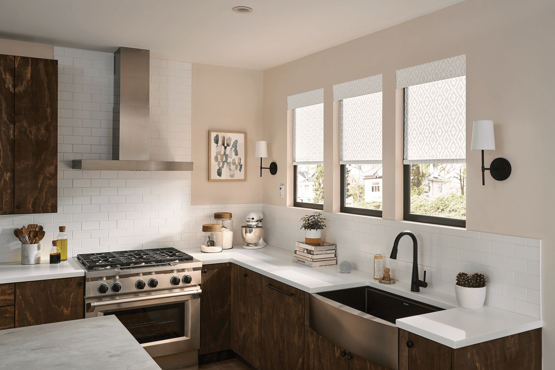 patterned roller shades in kitchen above sink